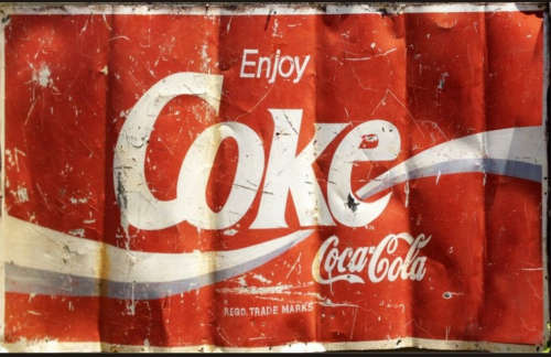 Coca-Cola Big distressed metal sign.