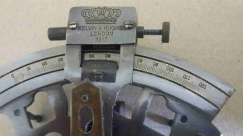 Sextant solid brass in Rosewood case.