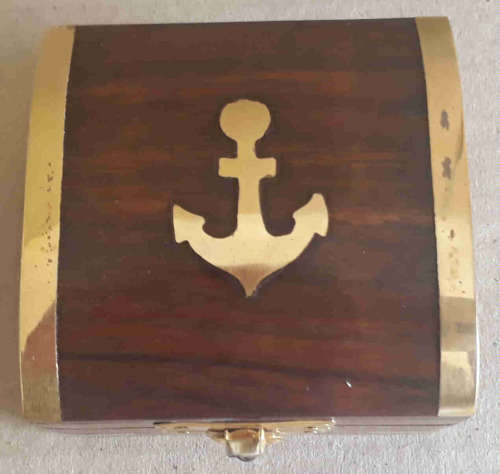 Brass Compass fitted in rose wood box.
