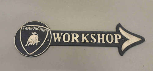 Lamborghini arrow cast iron sign.