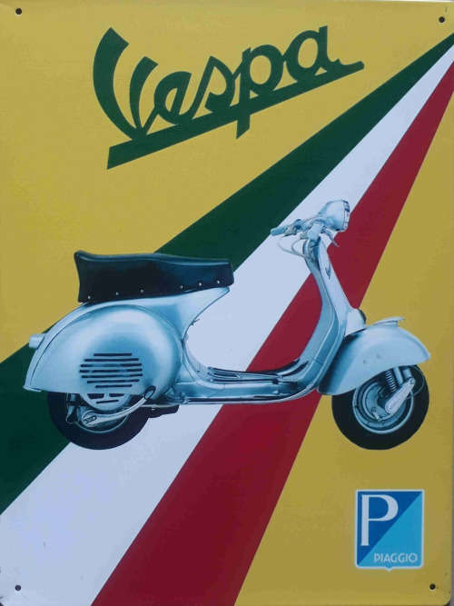 Vespa motor cycle metal sign.
