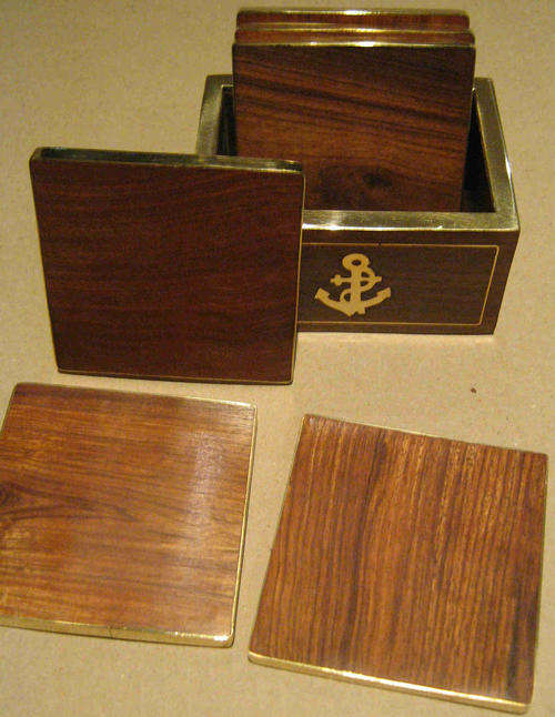 Coasters. set of 6 rosewood and brass drink coasters in wooden box