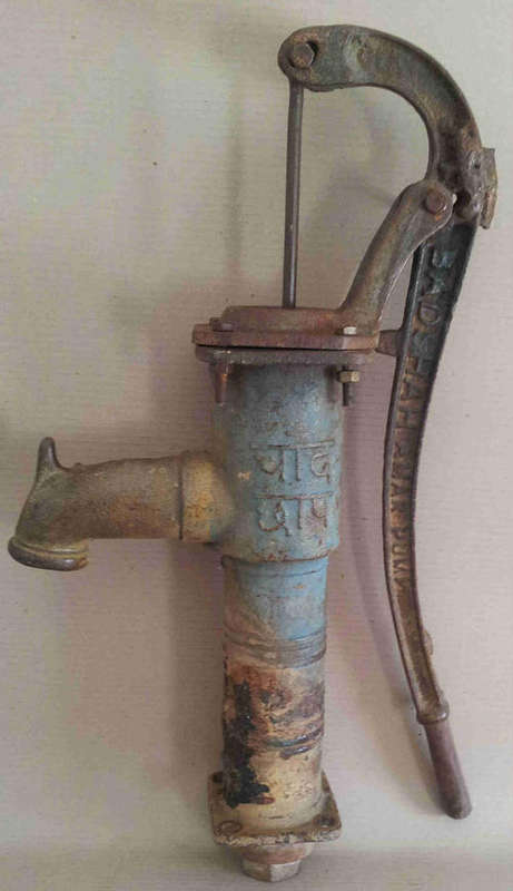 Well/bore hole pump. Really old