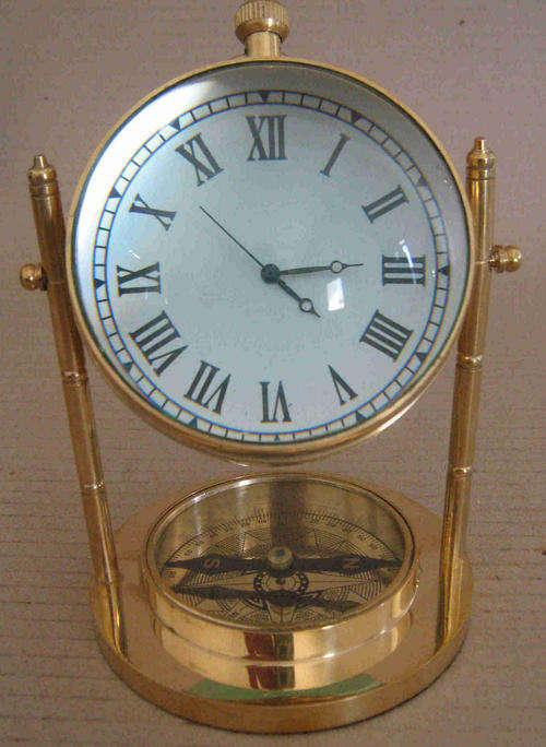 Clock. Desk top solid brass with compass fitted in the base             clk1