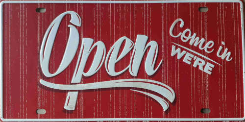 Open embossed license plate