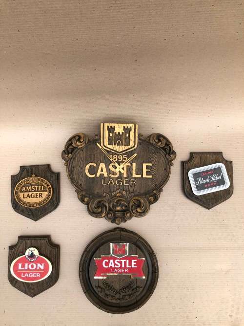Bar Plackards and Castle Lager Clock