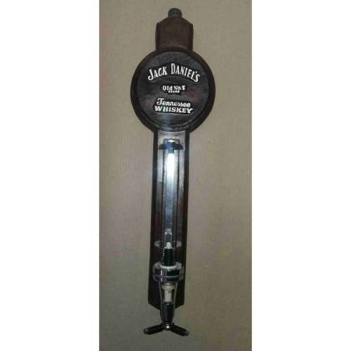 Single optic spirit tot measure dispenser on Jack Daniel`s  backing. Wall hanging.