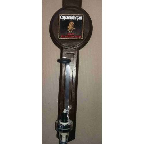 Single optic spirit tot measure dispenser on Captain Morgan  backing. Wall hanging.
