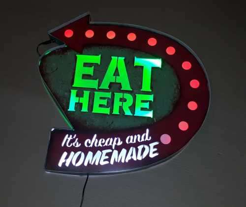 Eat here illuminated metal sign