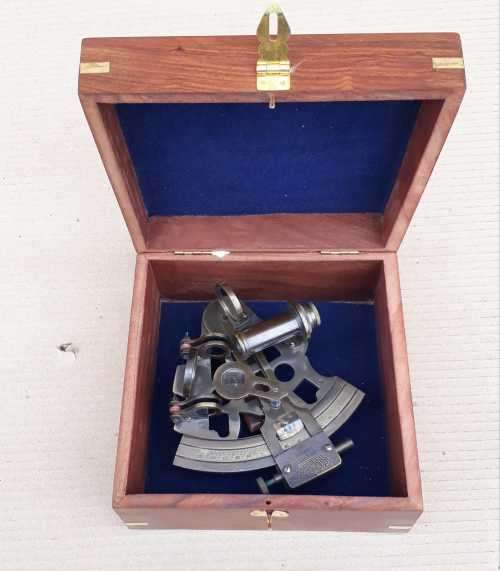 Sextant solid brass in Rosewood case.
