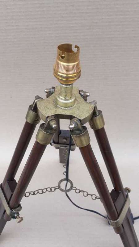 Wood and aluminium tripod lamp stand.