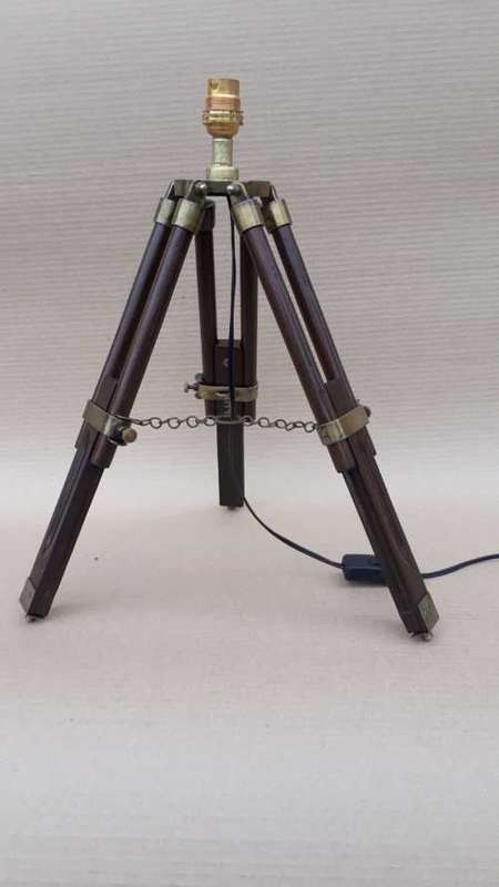 Wood and aluminium tripod lamp stand.