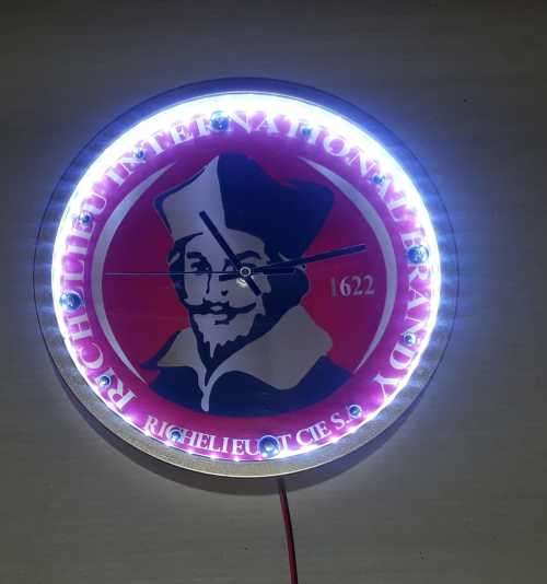 Richelieu illuminated clock. 30cm diameter.