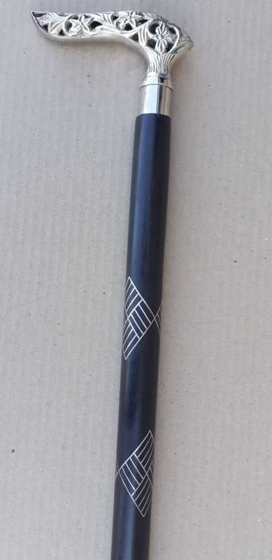 Walking stick. Rosewood with beautiful silver handle and rubber non slip bottom tip