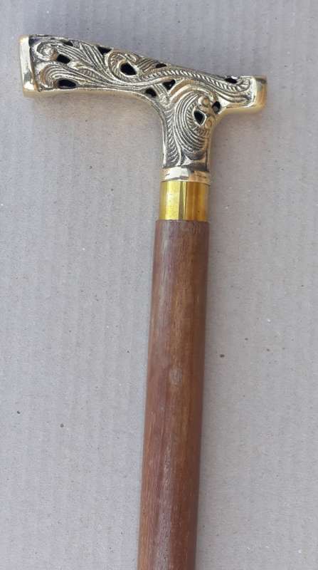 Walking stick. Rosewood with beautiful brass handle and rubber non slip bottom tip
