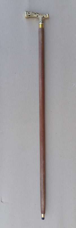 Walking stick. Rosewood with beautiful brass handle and rubber non slip bottom tip