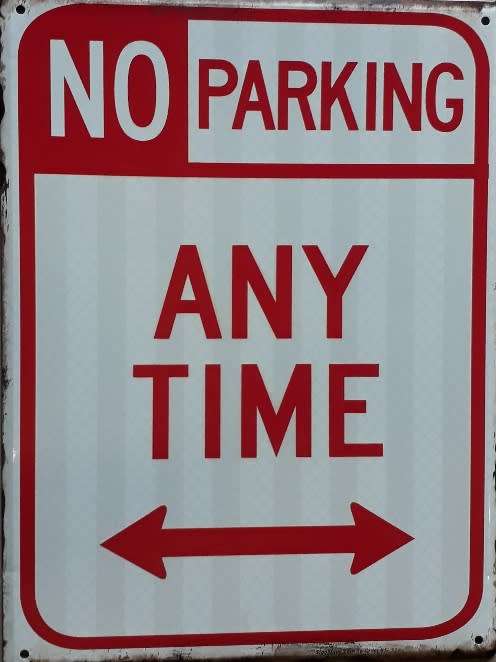 No parking any time metal sign