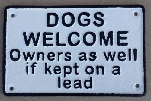 Dogs Welcome Cast Iron Wall Plaque