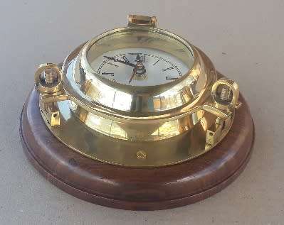 Decorative Brass Porthole Clock on a Solid Wooden Base