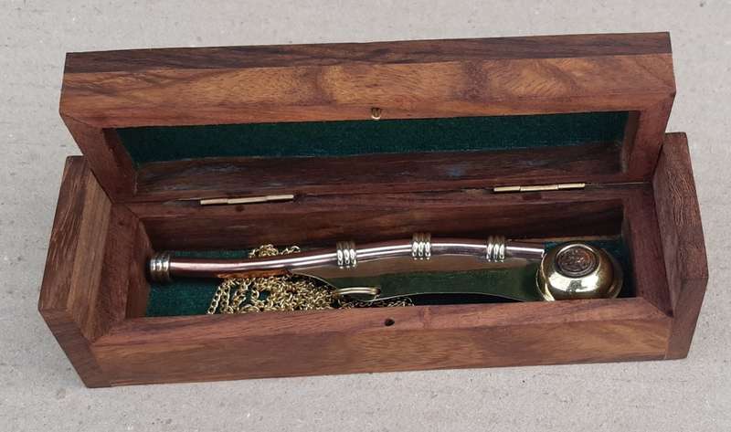 Nautical Boatswain Whistle in a wooden box.