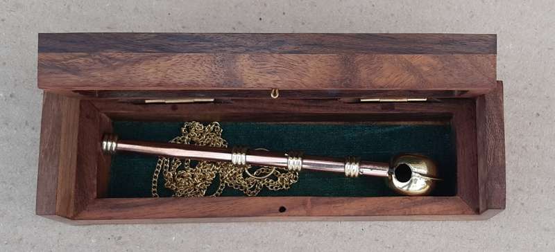 Nautical Boatswain Whistle in a wooden box.
