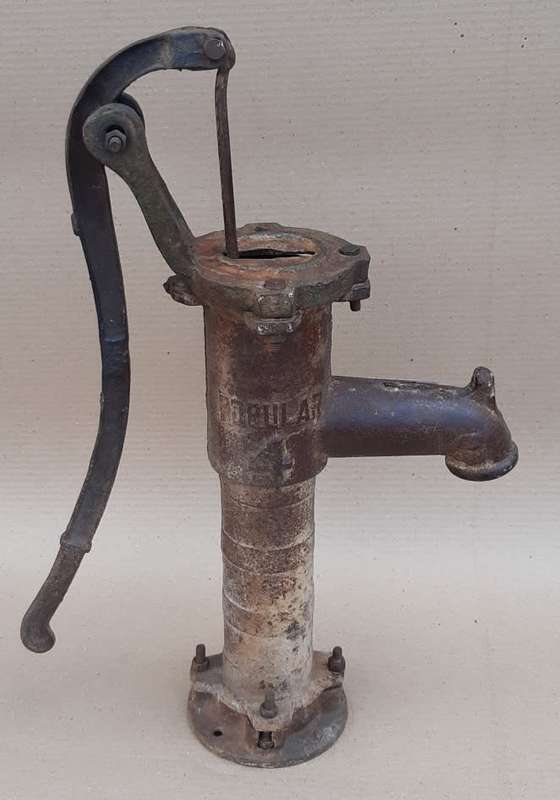 Well/borehole pump. Really old NO 5