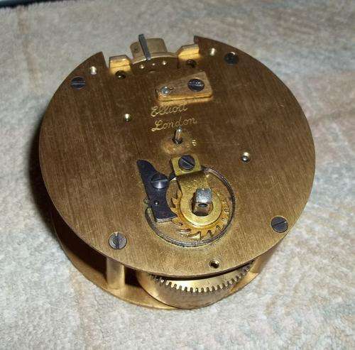R1.00 start! Elliot of London clock movement for repairs/spares. Barrel spring is fine.