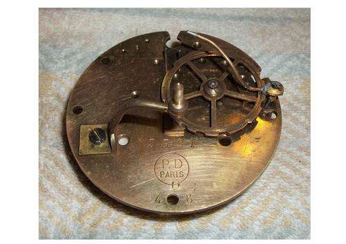 French clock spares. Marked P.D Paris. Back plate with count wheel, hammer lever & bell post
