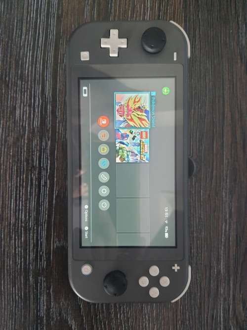 Nintendo Switch Lite - Grey - 2 Games + Extras