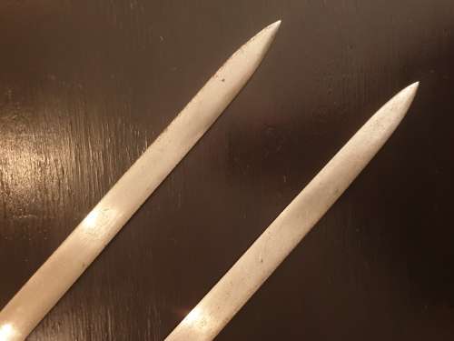 Two Ornamental Spanish Swords 58cm long.
