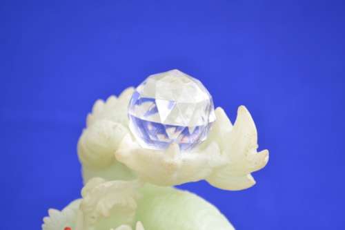 Feng Shui Dragon holding Crystal Ball - Light Green