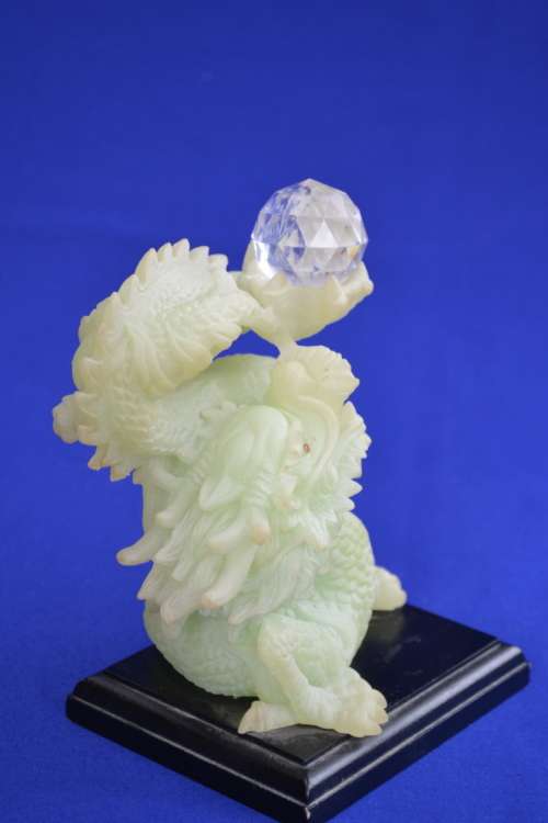 Feng Shui Dragon holding Crystal Ball - Light Green