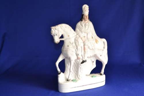Pair of 19th Century Staffordshire  Scottish highlander Huntsmen on Horseback