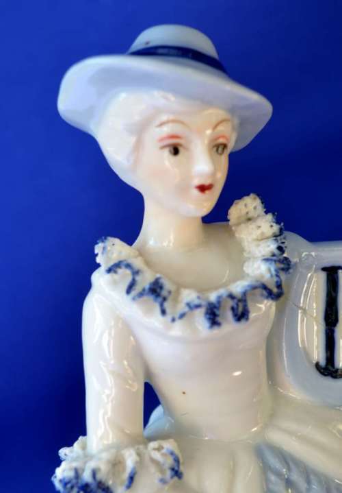 Vintage Blue and White Porcelain Figurine