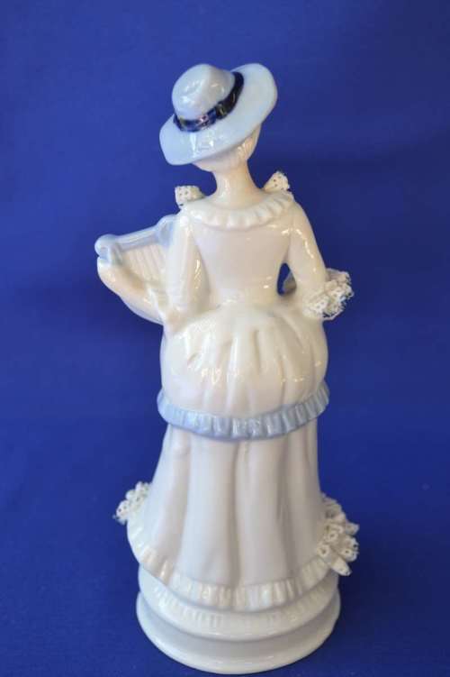 Vintage Blue and White Porcelain Figurine