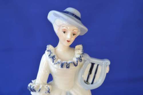 Vintage Blue and White Porcelain Figurine