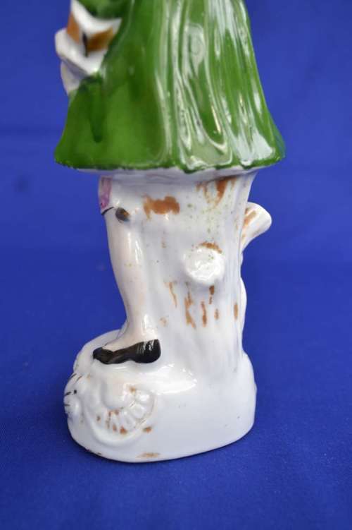 Porcelain Figure of a Young Man In Period Dress