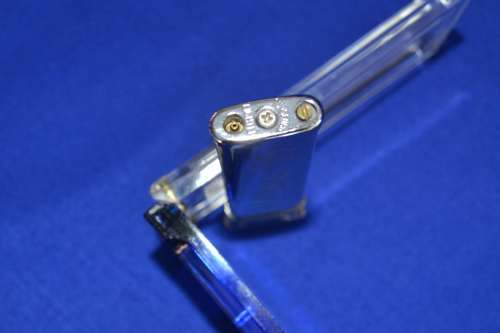 Zippo Lighter and Camel Branded Lighter in Perspex Case