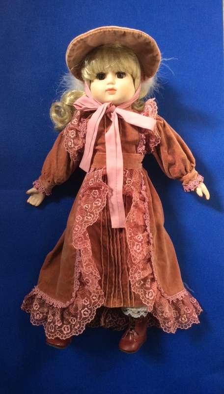 Two Collectable Vintage Porcelain Display Dolls with stands