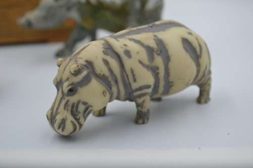 Hand Carved Stone Animals (Baberton) plus one Small Resin Warthog