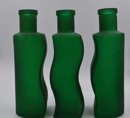 *** REDUCED ***. Green Frosted Glass Decorative Bottles