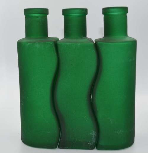 *** REDUCED ***. Green Frosted Glass Decorative Bottles