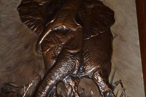 Copper Elephant Mounted on Kudu Skin with  Wooden Frame