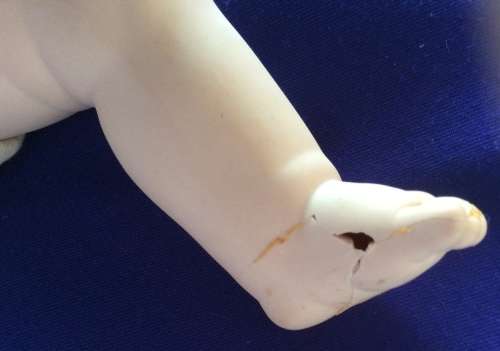 Vintage Porcelain Baby Doll - Repaired Foot