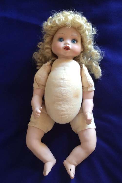 Vintage Porcelain Baby Doll - Repaired Foot