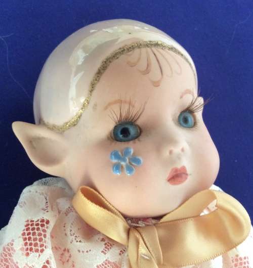 Porcelain Pixie Doll