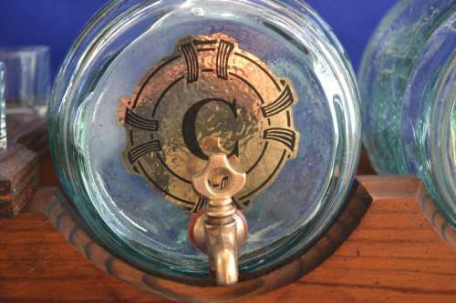 Vintage Light Green Glass Barrel Decanters on Wooden Stand