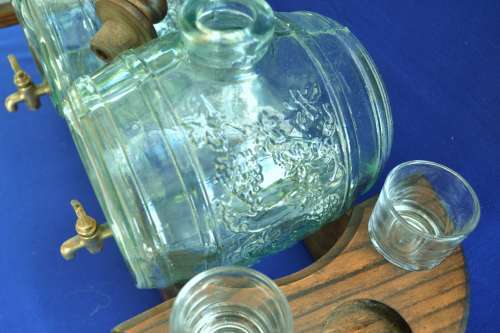 Vintage Light Green Glass Barrel Decanters on Wooden Stand