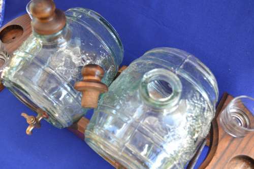 Vintage Light Green Glass Barrel Decanters on Wooden Stand