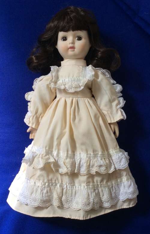 Vintage Porcelain Doll with Glasses